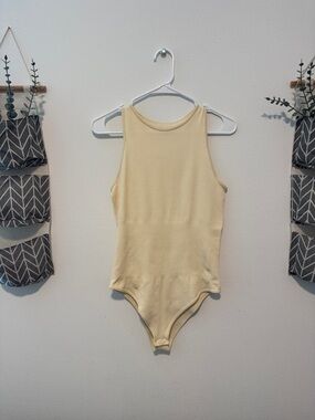 Sleeveless Cream Ribbed Women's Bodysuit